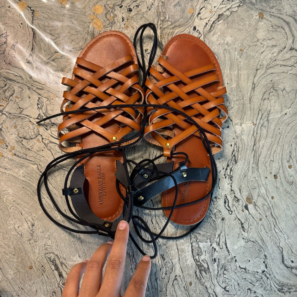 Like new American Eagle tie around sandals size 10
Like new condition